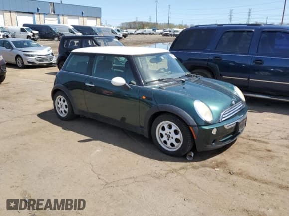 ✅ 2006 MINI Hardtop • VIN: WMWRC33546TK15957 • Lot: 54660995. Listed on Copart with 100,893 mi. Free auction sales archive from the USA and detailed vehicle history report at DreamBid. Image 4.