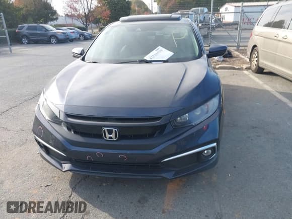 ✅ 2021 Honda Civic EX • VIN: 19XFC1F39ME000861 • Lot: 43518529. Listed on IAAI with 84,493 mi. Free auction sales archive from the USA and detailed vehicle history report at DreamBid. Image 12.