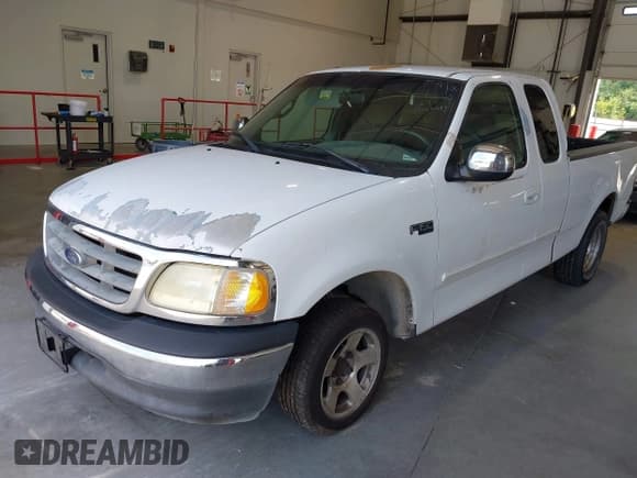 ✅ 2002 Ford F-150 XL • VIN: 1FTRX17282KC00308 • Lot: 42680596. Listed on IAAI with 198,892 mi. Free auction sales archive from the USA and detailed vehicle history report at DreamBid. Image 2.