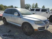 ✅ 2004 Volkswagen Touareg • VIN: WVGGH77L04D054425 • Лот: 69970584. Опубликован ранее на Copart с пробегом Не указан. Бесплатный доступ к архиву аукционных продаж из США и подробный отчёт об истории автомобиля на DreamBid. Изображение 4.