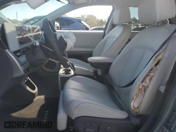 2023 Hyundai Ioniq 5 Limited z VIN KM8KRDAF1PU193475, wystawiony jako Copart lot #77376354 z przebiegiem 17 073 mil mil oraz Szkoda całkowita • Salvage title. Historia ofert i sprzedaży dostępna na DreamBid. Obrazek 7.