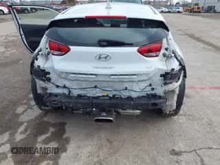 2019 Hyundai Veloster Premium z VIN KMHTG6AF8KU003038, wystawiony jako IAAI lot #41118865 z przebiegiem 65 014 mil mil oraz . Historia ofert i sprzedaży dostępna na DreamBid. Obrazek 6.