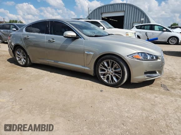 ✅ 2013 Jaguar XF RWD • VIN: SAJWA0E79D8S95654 • Lot: 64668775. Listed on Copart with 148,413 mi. Free auction sales archive from the USA and detailed vehicle history report at DreamBid. Image 4.