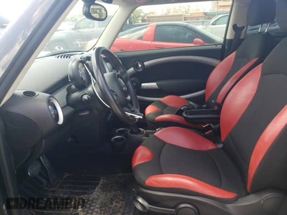 2011 MINI Hardtop S with VIN WMWSV3C53BTY15603, listed as a Copart auction lot 54893395 with 104,206 mi miles and Salvage title. Bid and sale history available at DreamBid. Image 7.