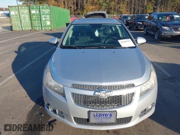 ✅ 2014 Chevrolet Cruze LTZ • VIN: 1G1PG5SB9E7158463 • Lot: 43589752. Listed on IAAI with 113,302 mi. Free auction sales archive from the USA and detailed vehicle history report at DreamBid. Image 6.