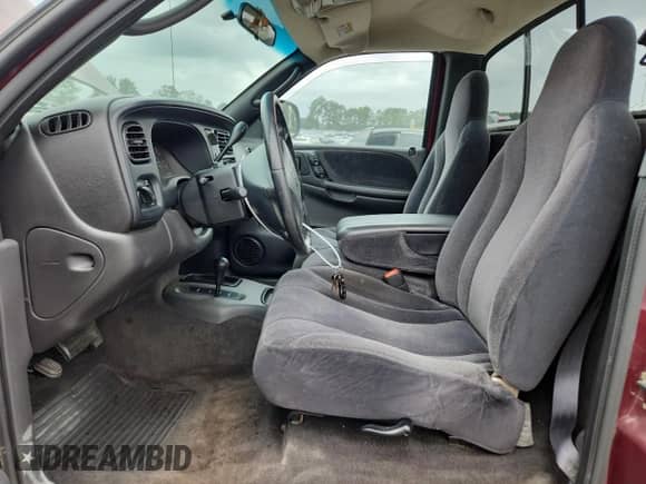 2000 Dodge Dakota Sport z VIN 1B7GG26N5YS650791, wystawiony jako Copart lot #63601765 z przebiegiem 80 841 mil mil oraz Szkoda całkowita • Salvage title. Historia ofert i sprzedaży dostępna na DreamBid. Obrazek 7.