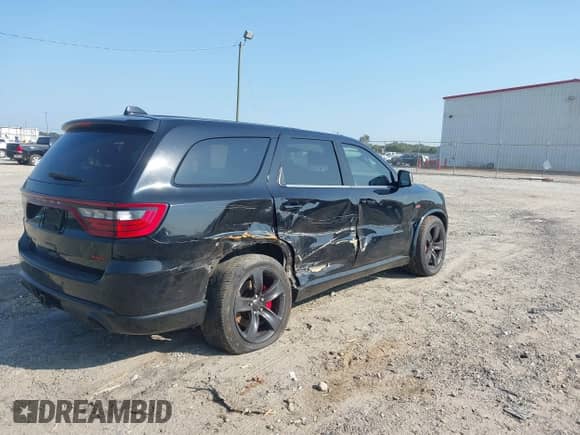 2018 Dodge Durango SRT z VIN 1C4SDJGJ0JC312711, wystawiony jako IAAI lot #43276349 z przebiegiem 155 860 mil mil oraz . Historia ofert i sprzedaży dostępna na DreamBid. Obrazek 4.