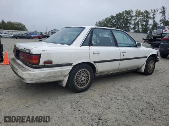✅ 1990 Toyota Camry • VIN: 4T1SV22E6LU267277 • Lot: 80152155. Wystawiony na Copart z przebiegiem 116 056 mil. Bezpłatny archiwum sprzedaży aukcyjnych z USA i szczegółowy raport historii pojazdu na DreamBid. Zdjęcie 3.