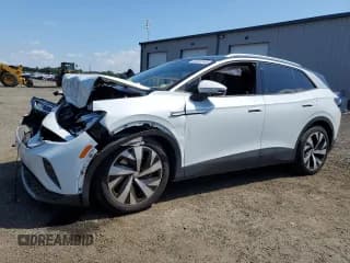 ✅ 2022 Volkswagen ID.4 Pro S • VIN: WVGKMPE2XNP036062 • Лот: 69350545. Опубликован ранее на Copart с пробегом 3 272 миль. Бесплатный доступ к архиву аукционных продаж из США и подробный отчёт об истории автомобиля на DreamBid. Изображение 1.