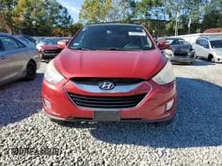 2012 Hyundai Tucson Limited with VIN KM8JUCAC9CU461659, listed as a Copart auction lot 86997645 with 118,532 mi miles and Clean title. Bid and sale history available at DreamBid. Image 5.