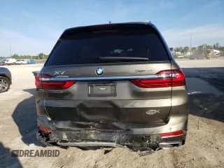 ✅ 2021 BMW X7 xDrive40i • VIN: 5UXCW2C02M9G58022 • Лот: 71882322. Опубликован ранее на Copart с пробегом 22 621 миль. Бесплатный доступ к архиву аукционных продаж из США и подробный отчёт об истории автомобиля на DreamBid. Изображение 6.