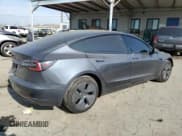 ✅ 2022 Tesla Model 3 • VIN: 5YJ3E1EA6NF249868 • Лот: 91277405. Опубликован ранее на Copart с пробегом 50 662 миль. Бесплатный доступ к архиву аукционных продаж из США и подробный отчёт об истории автомобиля на DreamBid. Изображение 3.