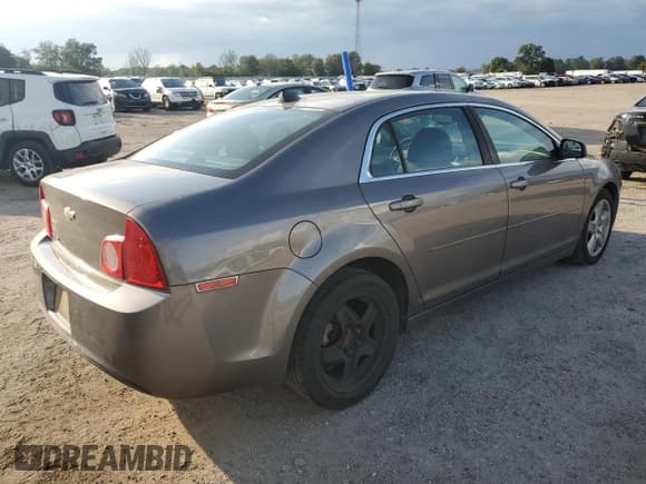 ✅ 2012 Chevrolet Malibu 1LS • VIN: 1G1ZB5E03CF340048 • Lot: 85201505. Listed on Copart with 143,836 mi. Free auction sales archive from the USA and detailed vehicle history report at DreamBid. Image 3.