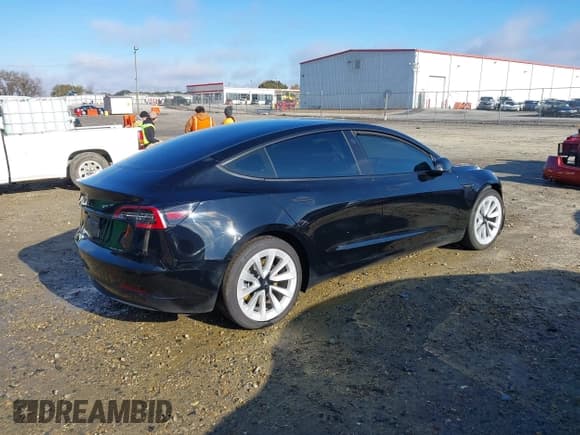 ✅ 2021 Tesla Model 3 Standard Range Plus • VIN: 5YJ3E1EA7MF051914 • Lot: 43603101. Listed on IAAI with 45,409 mi. Free auction sales archive from the USA and detailed vehicle history report at DreamBid. Image 4.