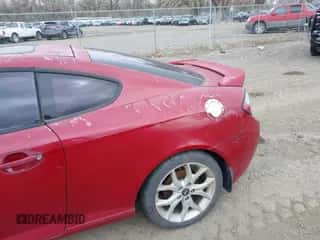2007 Hyundai Tiburon GT с VIN KMHHN66F67U251509, выставлен на аукционе IAAI как лот 42115300 с пробегом 180 334 миль миль и . История ставок и продаж доступна на DreamBid. Изображение 6.