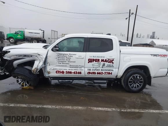 ✅ 2022 Toyota Tacoma TRD Off Road • VIN: 3TMCZ5AN1NM509349 • Lot: 43757147. Listed on IAAI with 24,320 mi. Free auction sales archive from the USA and detailed vehicle history report at DreamBid. Image 14.
