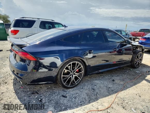 ✅ 2021 Audi S7 Prestige • VIN: WAUSFBF28MN077037 • Лот: 62517965. Опубликован ранее на Copart с пробегом 33 399 миль. Бесплатный доступ к архиву аукционных продаж из США и подробный отчёт об истории автомобиля на DreamBid. Изображение 3.