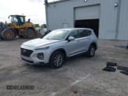 ✅ 2020 Hyundai Santa Fe SE • VIN: 5NMS2CAD3LH147634 • Lot: 42157709. Listed on IAAI with 69,496 mi. Free auction sales archive from the USA and detailed vehicle history report at DreamBid. Image 2.