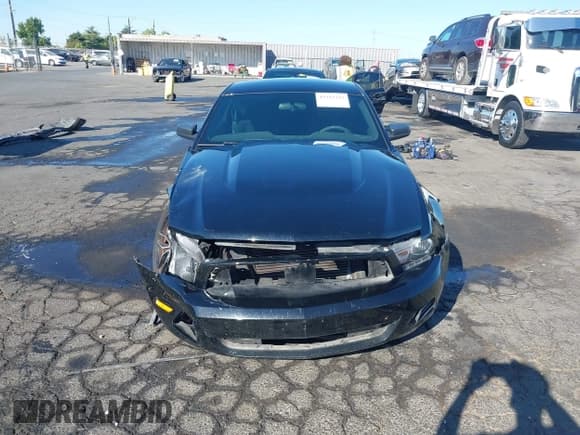 ✅ 2012 Ford Mustang Premium • VIN: 1ZVBP8AM4C5261141 • Lot: 43217325. Listed on IAAI with 129,419 mi. Free auction sales archive from the USA and detailed vehicle history report at DreamBid. Image 13.