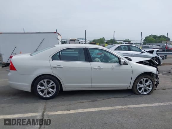 ✅ 2012 Ford Fusion SE • VIN: 3FAHP0HG7CR368279 • Lot: 42288523. Listed on IAAI with 176,808 mi. Free auction sales archive from the USA and detailed vehicle history report at DreamBid. Image 13.