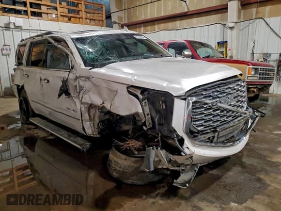 ✅ 2019 GMC Yukon Denali • VIN: 1GKS2CKJ0KR249346 • Lot: 94115105. Listed on Copart with 96,378 mi. Free auction sales archive from the USA and detailed vehicle history report at DreamBid. Image 4.