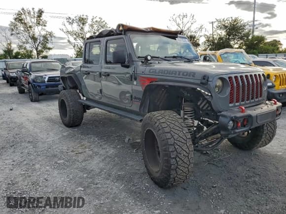 ✅ 2021 Jeep Gladiator Sport S • VIN: 1C6JJTAG2ML548964 • Лот: 96478345. Опубликован ранее на Copart с пробегом 57 333 миль. Бесплатный доступ к архиву аукционных продаж из США и подробный отчёт об истории автомобиля на DreamBid. Изображение 4.