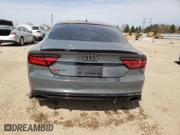 ✅ 2016 Audi RS 7 Prestige • VIN: WUAW2AFC2GN901494 • Lot: 52958345. Wystawiony na Copart z przebiegiem 99 718 mil. Bezpłatny archiwum sprzedaży aukcyjnych z USA i szczegółowy raport historii pojazdu na DreamBid. Zdjęcie 6.