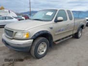 ✅ 2000 Ford F-150 XL • VIN: 1FTRX18L4YNA56609 • Lot: 43577593. Listed on IAAI with 254,484 mi. Free auction sales archive from the USA and detailed vehicle history report at DreamBid. Image 2.