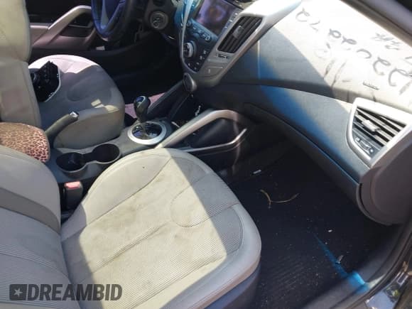 ✅ 2012 Hyundai Veloster w/Gray Int • VIN: KMHTC6AD4CU070537 • Lot: 42202272. Wystawiony na IAAI z przebiegiem 120 054 mil. Bezpłatny archiwum sprzedaży aukcyjnych z USA i szczegółowy raport historii pojazdu na DreamBid. Zdjęcie 5.