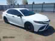 2021 Toyota Camry SE with VIN 4T1G11BK5MU020920, listed as a IAAI auction lot 42128509 with 40,498 mi miles and . Bid and sale history available at DreamBid. Image 1.