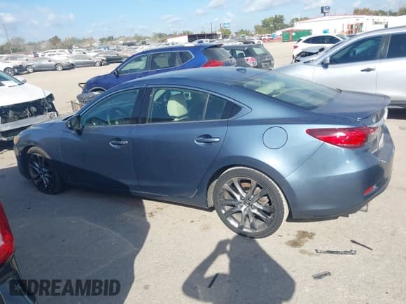 ✅ 2014 Mazda 6 i Grand Touring • VIN: JM1GJ1W62E1126147 • Lot: 43697289. Listed on IAAI with 140,014 mi. Free auction sales archive from the USA and detailed vehicle history report at DreamBid. Image 14.