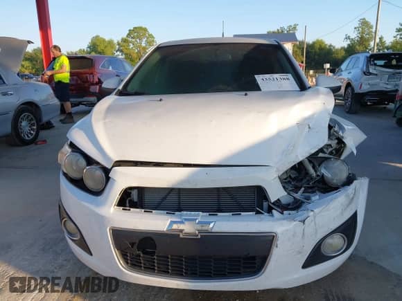 2014 Chevrolet Sonic LT with VIN 1G1JC5SG9E4127762, listed as a IAAI auction lot 43521388 with 128,333 mi miles and . Bid and sale history available at DreamBid. Image 12.