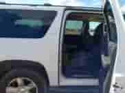 2008 Chevrolet Suburban LTZ z VIN 1GNFK16318R127690, wystawiony jako IAAI lot #43424584 z przebiegiem 278 244 mil mil oraz . Historia ofert i sprzedaży dostępna na DreamBid. Obrazek 8.