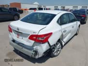 ✅ 2017 Nissan Sentra SL • VIN: 3N1AB7AP3HY348415 • Lot: 42027013. Listed on IAAI with 125,884 mi. Free auction sales archive from the USA and detailed vehicle history report at DreamBid. Image 4.