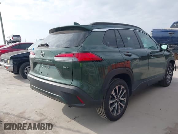 ✅ 2023 Toyota Corolla Cross XLE • VIN: 7MUEAAAG5PV058624 • Лот: 43478337. Опубликован ранее на IAAI с пробегом 28 466 миль. Бесплатный доступ к архиву аукционных продаж из США и подробный отчёт об истории автомобиля на DreamBid. Изображение 4.