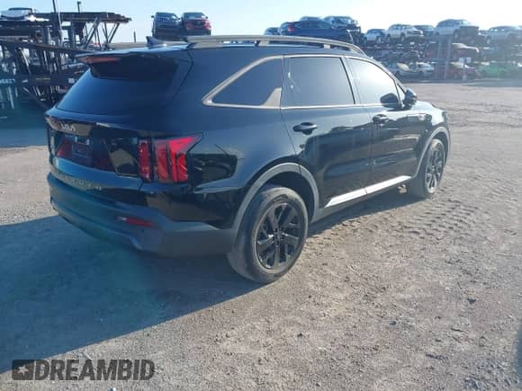 2022 Kia Sorento X-Line S z VIN 5XYRLDLC4NG102771, wystawiony jako IAAI lot #42654251 z przebiegiem 39 228 mil mil oraz . Historia ofert i sprzedaży dostępna na DreamBid. Obrazek 4.