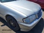 ✅ 1999 Mercedes-Benz C 230/260/280/320 • VIN: WDBHA29G2XA704389 • Lot: 42899909. Listed on IAAI with 225,873 mi. Free auction sales archive from the USA and detailed vehicle history report at DreamBid. Image 14.