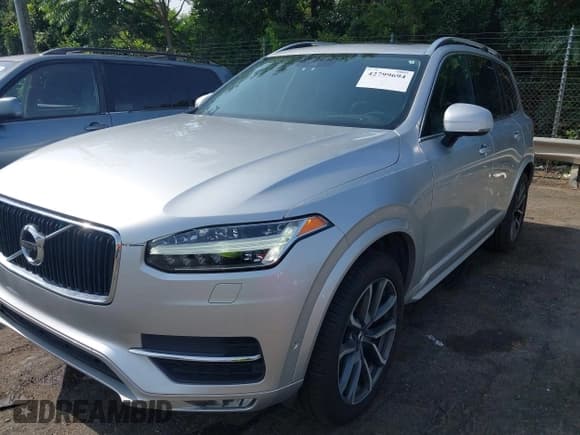 ✅ 2017 Volvo XC90 Momentum • VIN: YV4A22PK7H1157061 • Lot: 42799694. Listed on IAAI with 143,739 mi. Free auction sales archive from the USA and detailed vehicle history report at DreamBid. Image 2.