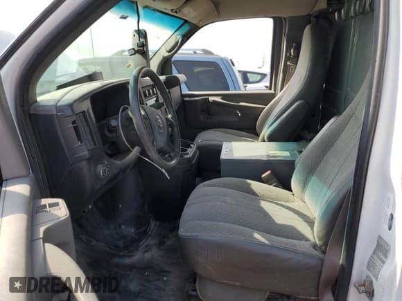 ✅ 2014 Chevrolet Express Cargo • VIN: 1GCWGFCA8E1147441 • Lot: 54336595. Listed on Copart with 143,473 mi. Free auction sales archive from the USA and detailed vehicle history report at DreamBid. Image 7.