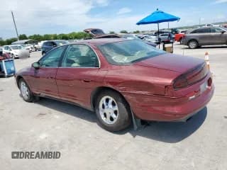 ✅ 1999 Oldsmobile Aurora • VIN: 1G3GR62C0X4109351 • Lot: 66501485. Wystawiony na Copart z przebiegiem 83 131 mil. Bezpłatny archiwum sprzedaży aukcyjnych z USA i szczegółowy raport historii pojazdu na DreamBid. Zdjęcie 2.