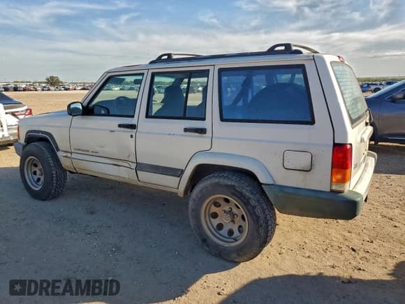 ✅ 2001 Jeep Cherokee Sport • VIN: 1J4FT48S21L614170 • Lot: 94708945. Listed on Copart with 173,209 mi. Free auction sales archive from the USA and detailed vehicle history report at DreamBid. Image 2.