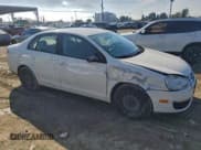 ✅ 2010 Volkswagen Jetta S • VIN: 3VWJZ7AJ6AM064274 • Lot: 94191905. Listed on Copart with 66,910 mi. Free auction sales archive from the USA and detailed vehicle history report at DreamBid. Image 4.