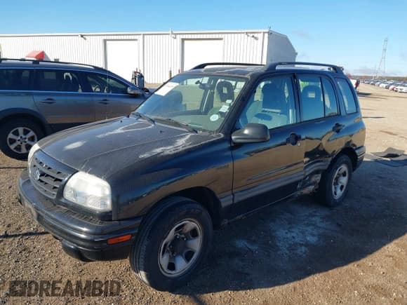 ✅ 2002 Suzuki Vitara JLX • VIN: 2S3TD52V226105111 • Лот: 43564335. Опубликован ранее на IAAI с пробегом 115 000 миль. Бесплатный доступ к архиву аукционных продаж из США и подробный отчёт об истории автомобиля на DreamBid. Изображение 17.