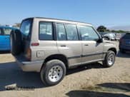 ✅ 1995 Suzuki Sidekick JS • VIN: 2S3TE02V1S6406369 • Lot: 67108335. Listed on Copart with 114,976 mi. Free auction sales archive from the USA and detailed vehicle history report at DreamBid. Image 3.