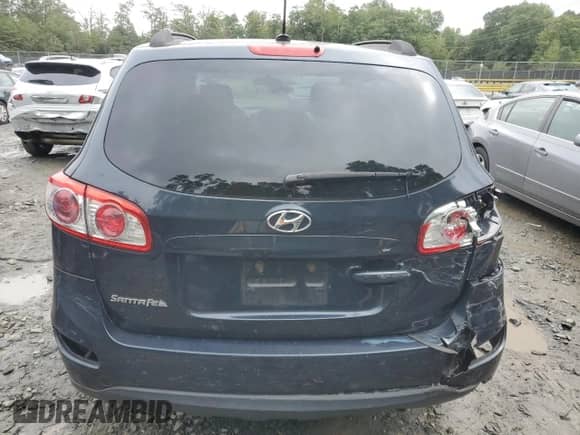 2012 Hyundai Santa Fe GLS с VIN 5XYZG3AB0CG103177, выставлен на аукционе Copart как лот 73674574 с пробегом 181 969 миль миль и Списание • Salvage title. История ставок и продаж доступна на DreamBid. Изображение 6.