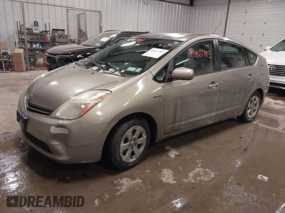 ✅ 2007 Toyota Prius • VIN: JTDKB20U677556817 • Lot: 43827783. Listed on IAAI with 155,956 mi. Free auction sales archive from the USA and detailed vehicle history report at DreamBid. Image 2.