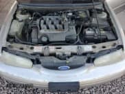 ✅ 1996 Ford Contour • VIN: 1FALP65L3TK117309 • Лот: 88454995. Опубликован ранее на Copart с пробегом 100 401 миль. Бесплатный доступ к архиву аукционных продаж из США и подробный отчёт об истории автомобиля на DreamBid. Изображение 11.