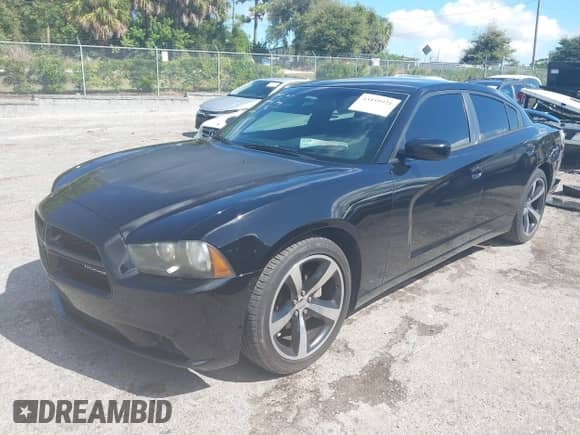 2014 Dodge Charger SXT с VIN 2C3CDXHG0EH358878, выставлен на аукционе IAAI как лот 43459921 с пробегом 212 249 миль миль и . История ставок и продаж доступна на DreamBid. Изображение 2.
