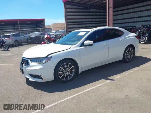 ✅ 2019 Acura TLX • VIN: 19UUB2F38KA009584 • Lot: 43418348. Listed on IAAI with 30,571 mi. Free auction sales archive from the USA and detailed vehicle history report at DreamBid. Image 18.