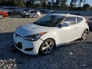 ✅ 2012 Hyundai Veloster w/Red Int • VIN: KMHTC6AD8CU045639 • Lot: 90627155. Wystawiony na Copart z przebiegiem 179 506 mil. Bezpłatny archiwum sprzedaży aukcyjnych z USA i szczegółowy raport historii pojazdu na DreamBid. Zdjęcie 1.
